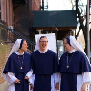 Sisters walking in city